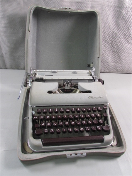 VINTAGE OLYMPIA PORTABLE TYPEWRITER IN CARRY CASE
