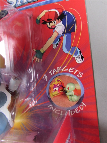 2 FACTORY SEALED POKEMON SLIDERS