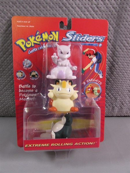 2 FACTORY SEALED POKEMON SLIDERS