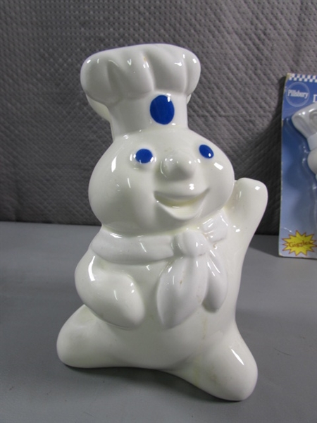 PILLSBURY DOUGHBOY COOKIE JAR, TIMER, NAPKIN HOLDER & VINYL DOLL