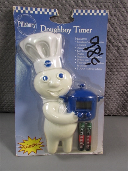 PILLSBURY DOUGHBOY COOKIE JAR, TIMER, NAPKIN HOLDER & VINYL DOLL