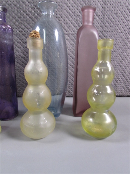 COLLECTION OF SMALL COLORED GLASS BOTTLES