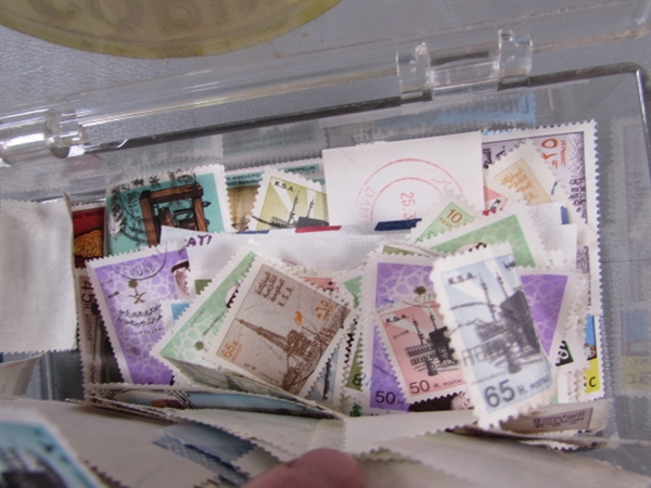 6 SMALL PLASTIC BOXES W/ASSORTED LOOSE POSTAGE STAMPS FOR COLLECTORS