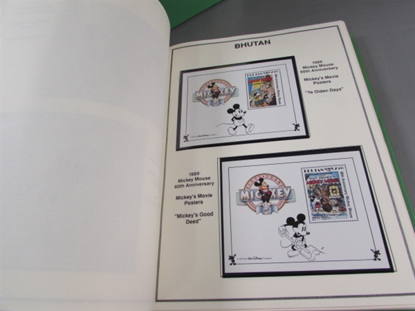 2 DISNEY WORLD OF POSTAGE STAMPS ALBUMS