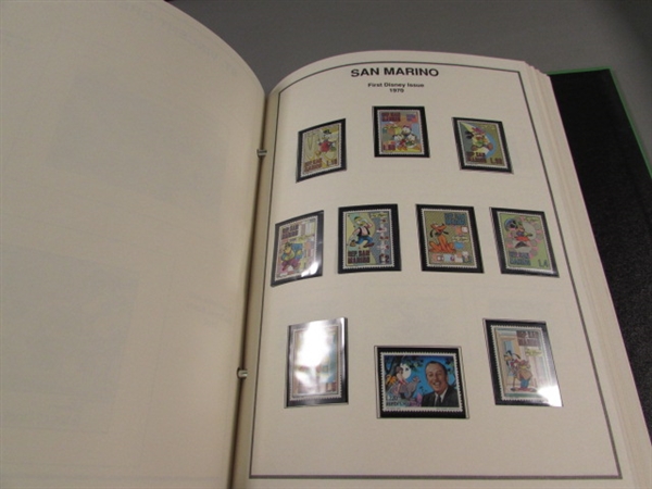 2 DISNEY WORLD OF POSTAGE STAMPS ALBUMS