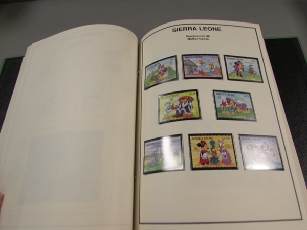 2 DISNEY WORLD OF POSTAGE STAMPS ALBUMS