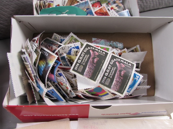 BOXES & GLASSINE ENVELOPES OF POSTAGE STAMPS FROM AROUND THE WORLD