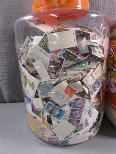 2 LARGE CONTAINERS OF POSTAGE STAMPS & MISC