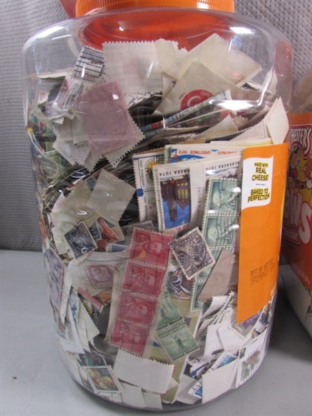 2 LARGE CONTAINERS OF POSTAGE STAMPS & MISC