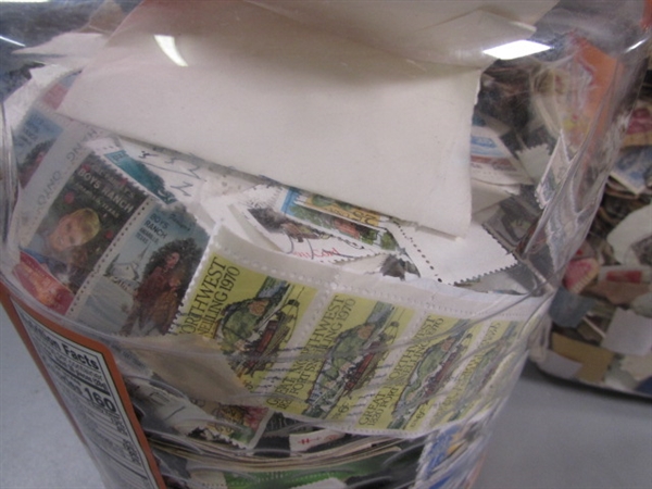 2 LARGE CONTAINERS OF POSTAGE STAMPS & MISC