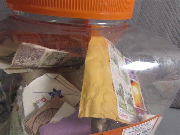 2 LARGE CONTAINERS OF POSTAGE STAMPS & MISC