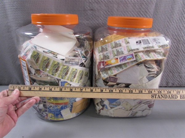 2 LARGE CONTAINERS OF POSTAGE STAMPS & MISC