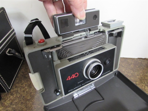 VINTAGE POLAROID LAND CAMERA W/FILM, FLASH UNIT, BULBS & MORE