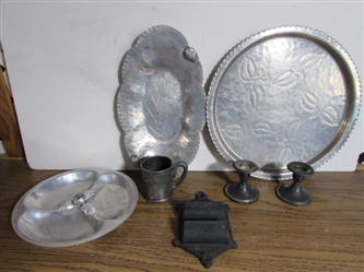 HAND WROUGHT ALUMINUM PLATTERS, CAST IRON MATCH HOLDER & SILVER PLATE CUP W/CANDLE & CANDLESTICKS