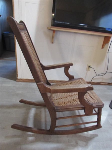 ANTIQUE EASTLAKE CANED ROCKING CHAIR W/BEAR BLANKETS