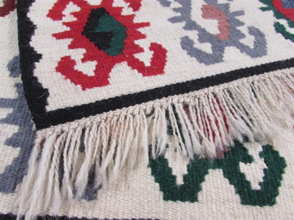 HAND WOVEN WOOL RUG