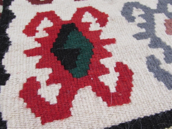 HAND WOVEN WOOL RUG