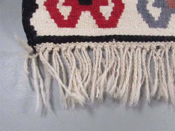 HAND WOVEN WOOL RUG