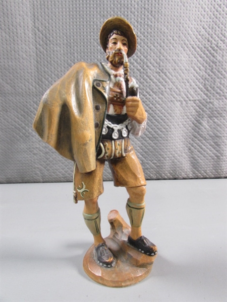 HAND CARVED SWISS SMOKING FIGURINE