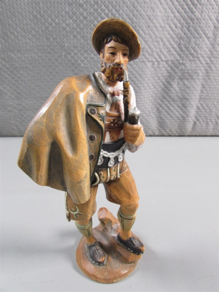 HAND CARVED SWISS SMOKING FIGURINE