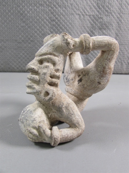 PRIMITIVE ACROBAT FIGURINE