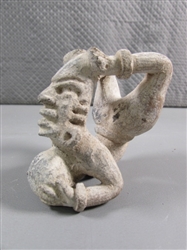 PRIMITIVE ACROBAT FIGURINE