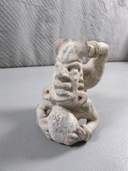 PRIMITIVE ACROBAT FIGURINE