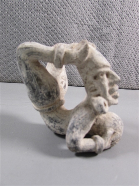 PRIMITIVE ACROBAT FIGURINE