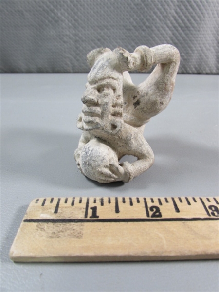 PRIMITIVE ACROBAT FIGURINE