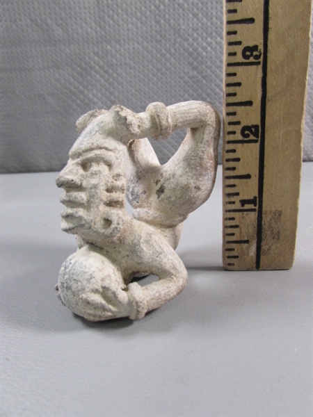 PRIMITIVE ACROBAT FIGURINE