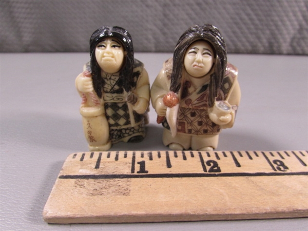 SMALL CARVED ASIAN FIGURES W/CHANGING FACES - RESIIN