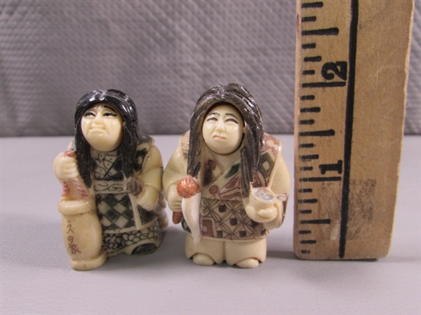 SMALL CARVED ASIAN FIGURES W/CHANGING FACES - RESIIN