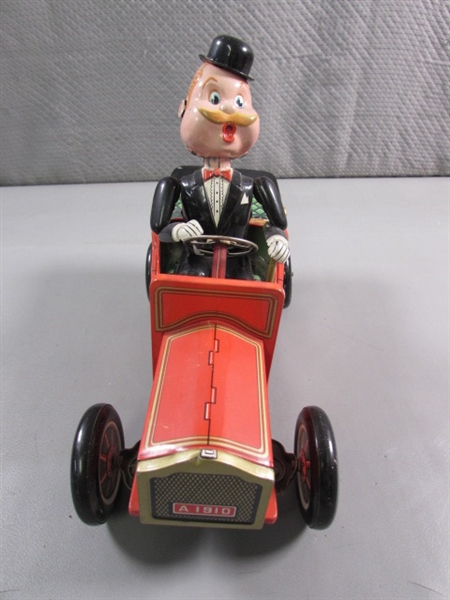 VINTAGE TIN BATTERY OPERATED GOLDEN JUBILEE TOY