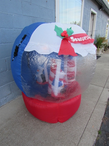 INFLATABLE ANIMATED CHRISTMAS MERRY-GO-ROUND SNOWGLOBE