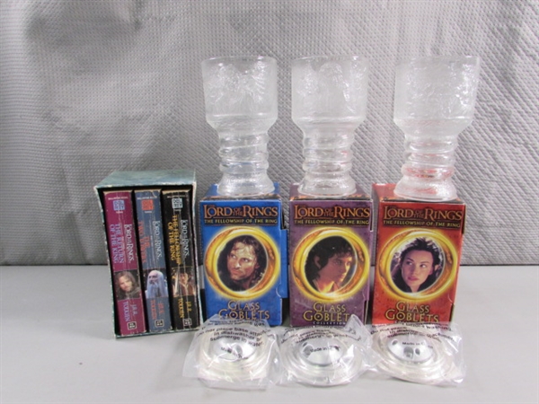 LORD OF THE RINGS TRILOGY IN PAPERBACK & THREE NEW GLASS GOBLETS THAT LIGHT UP