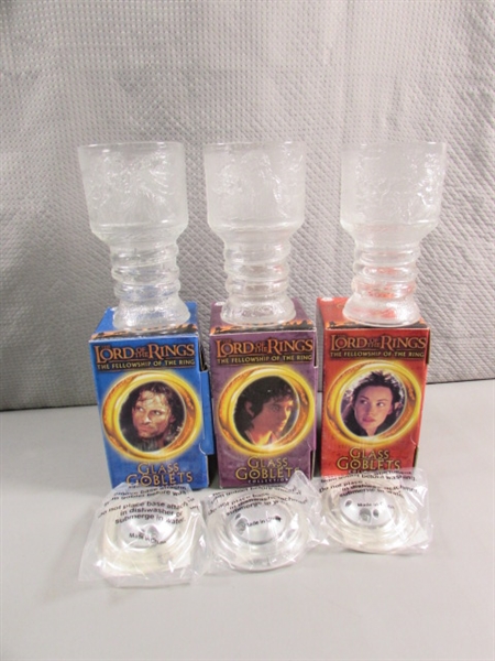 LORD OF THE RINGS TRILOGY IN PAPERBACK & THREE NEW GLASS GOBLETS THAT LIGHT UP