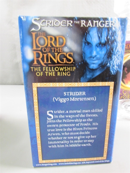 LORD OF THE RINGS TRILOGY IN PAPERBACK & THREE NEW GLASS GOBLETS THAT LIGHT UP