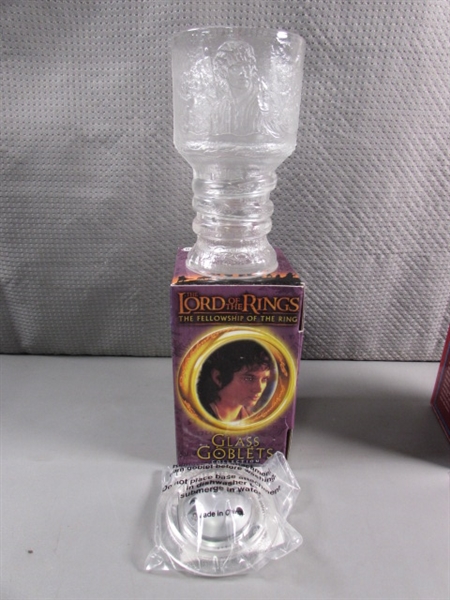 LORD OF THE RINGS TRILOGY IN PAPERBACK & THREE NEW GLASS GOBLETS THAT LIGHT UP