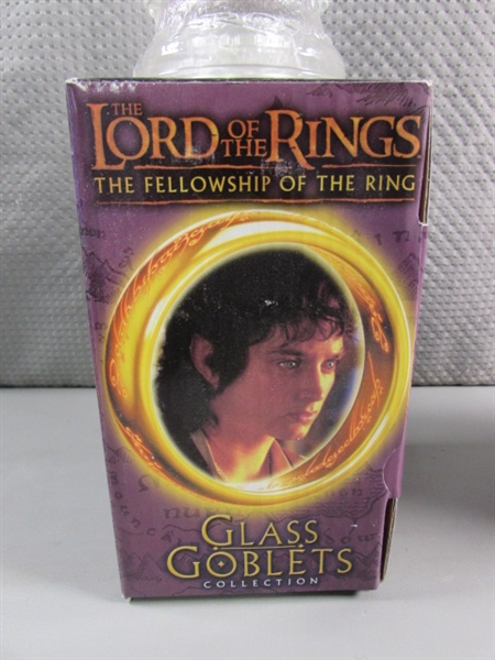 LORD OF THE RINGS TRILOGY IN PAPERBACK & THREE NEW GLASS GOBLETS THAT LIGHT UP