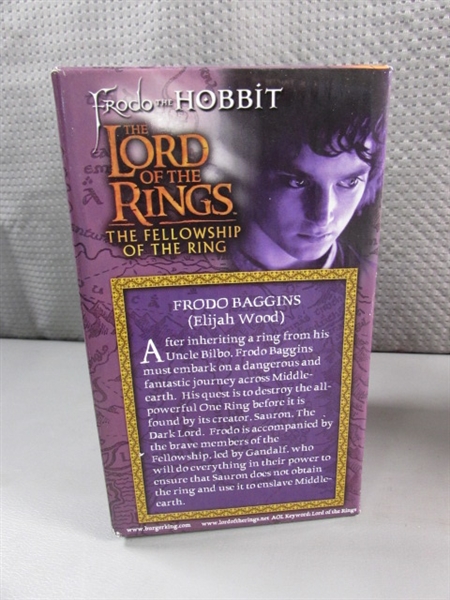 LORD OF THE RINGS TRILOGY IN PAPERBACK & THREE NEW GLASS GOBLETS THAT LIGHT UP