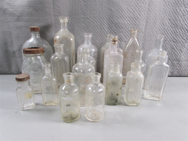 LOT #4 VINTAGE & ANTIQUE CLEAR GLASS BOTTLES W/RAISED LETTERING