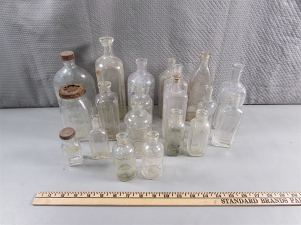 LOT #4 VINTAGE & ANTIQUE CLEAR GLASS BOTTLES W/RAISED LETTERING