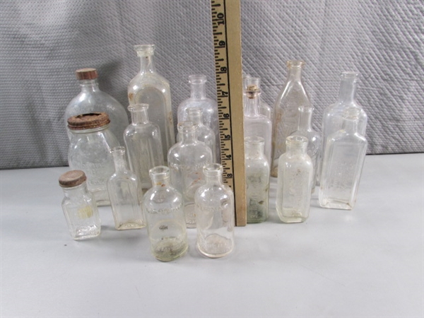 LOT #4 VINTAGE & ANTIQUE CLEAR GLASS BOTTLES W/RAISED LETTERING