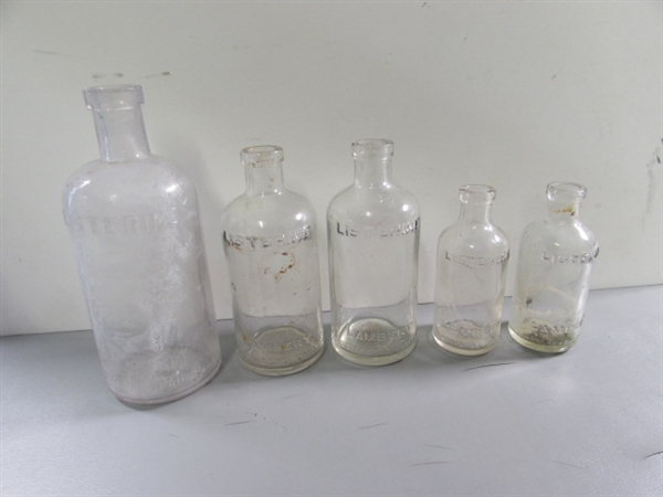 LOT #4 VINTAGE & ANTIQUE CLEAR GLASS BOTTLES W/RAISED LETTERING