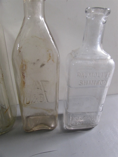 LOT #4 VINTAGE & ANTIQUE CLEAR GLASS BOTTLES W/RAISED LETTERING