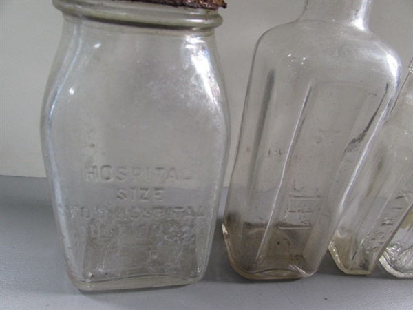 LOT #4 VINTAGE & ANTIQUE CLEAR GLASS BOTTLES W/RAISED LETTERING