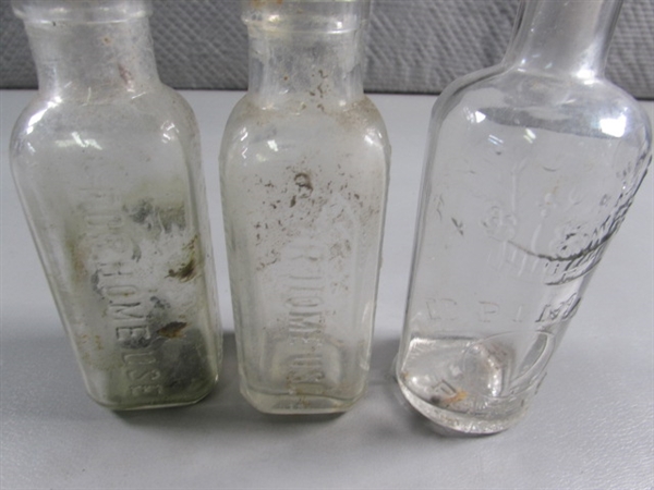 LOT #4 VINTAGE & ANTIQUE CLEAR GLASS BOTTLES W/RAISED LETTERING