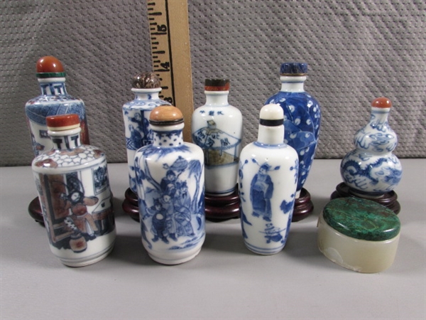 COLLECTION OF SMALL ORIENTAL BOTTLES WITH STONE STOPPERS