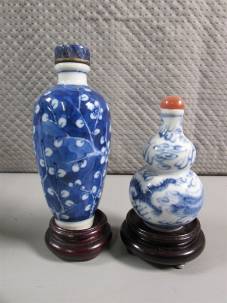 COLLECTION OF SMALL ORIENTAL BOTTLES WITH STONE STOPPERS