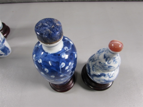 COLLECTION OF SMALL ORIENTAL BOTTLES WITH STONE STOPPERS